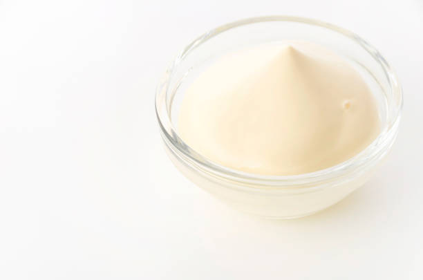 istock Delicious mayonnaise on white background 1320255642