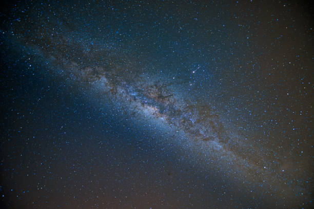 istock Night landscape with colorful Milky Way. Starry sky. Beautiful universe. Space background. 1320255659