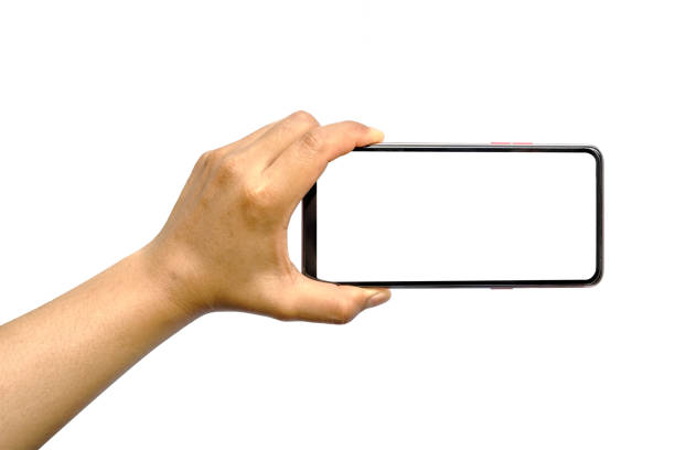 istock The hand is holding the white screen, the mobile phone is isolated on a white background 1320258332