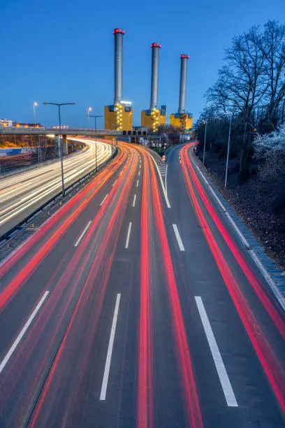 Photo of Freeway and power station at dusk