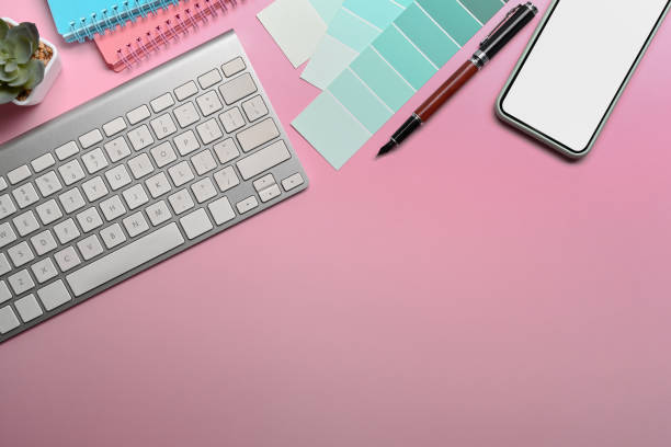 istock Mock up smart phone, notebook and coffee cup on woman workplace. 1320268710