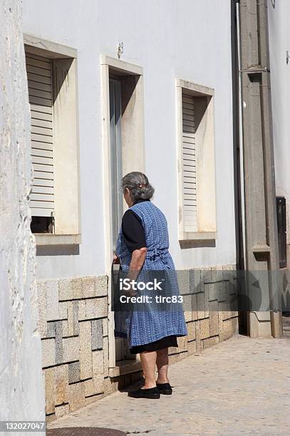 Old Portugese Woman Entering House Stock Photo - Download Image Now - Adult, Algarve, Cultures