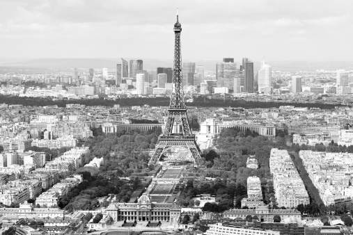 Paris, France - aerial city view Eiffel Tower and La Defense district. UNESCO World Heritage Site. Black and white tone - retro monochrome style.