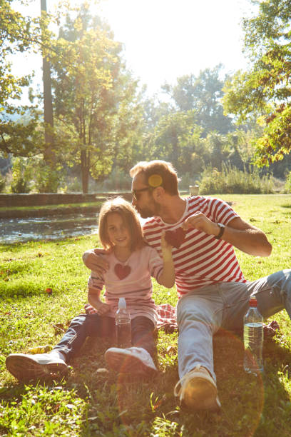 istock Daughter and father enjoying outdoors nature. 1320272520