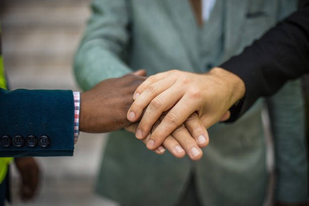 istock Hand of business men. Great team. 1320274735
