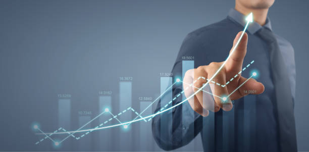 istock Businessman plan graph growth increase of chart positive indicators in his business 1320274995