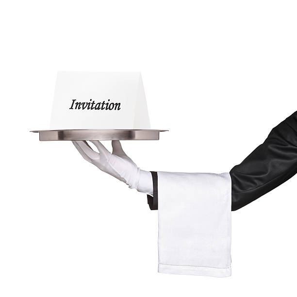 istock Waiter holding a tray with an invitation 132027502