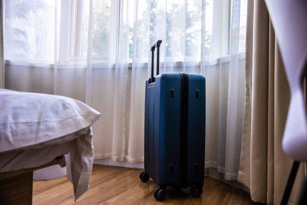 istock Luggage In Hotel Room 1320275503