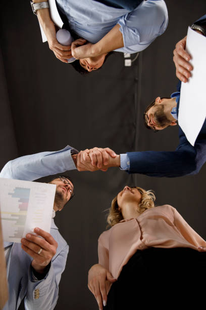 istock Two businessmen shaking hands after a successful meeting 1320278886