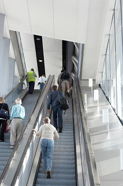 istock Airport escalator travellers 132028914