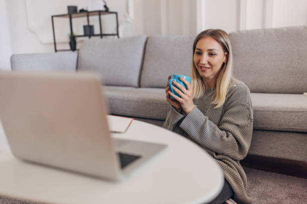 istock Woman studying at home 1320289168