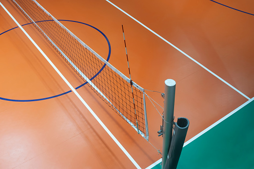 Close up photo of volleyball court, no people. Horizontal composition with copy space.