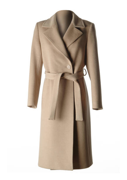 istock camel coat for woman, isolated on white 1320289799
