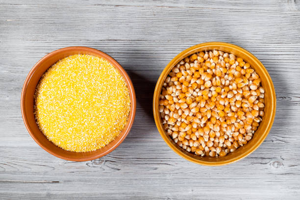 istock corn seeds and cornmeal in round ceramic bowls 1320292516