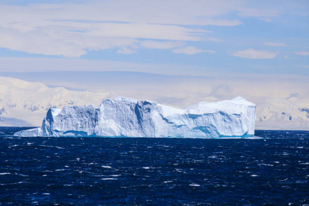 istock View of enormous iceberg floating on Antarctic Ocean 1320293738