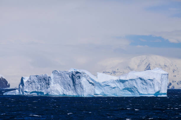 istock View of enormous iceberg floating on Antarctic Ocean 1320293774