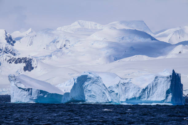 istock View of enormous iceberg floating on Antarctic Ocean 1320293910
