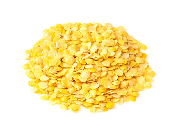 istock pile of split yellow lentils closeup on white 1320294035