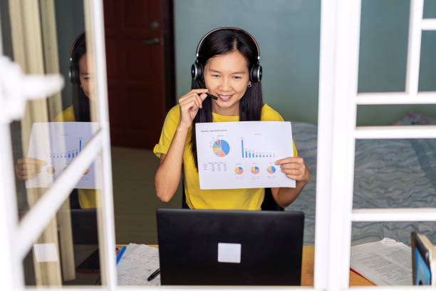 istock woman having video conference call on laptop computer at home 1320294587