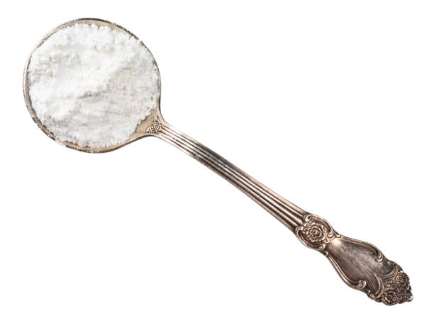 istock baking powder in silver tablespoon cutout 1320295462