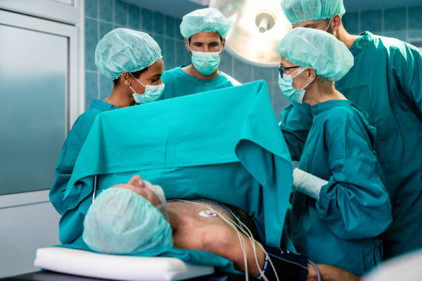istock Surgery team operating in a surgical room 1320295733
