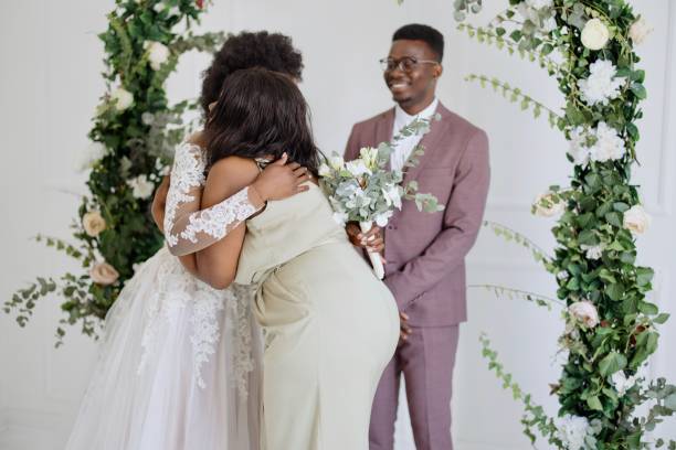 istock Friends congratulate the newlyweds on their wedding 1320299539