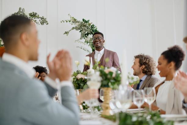 istock Groom giving a toast and speech at a wedding reception 1320299594