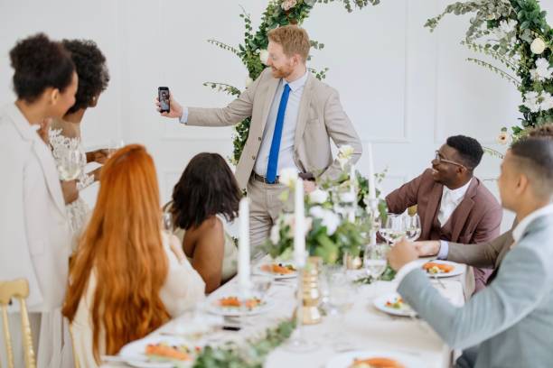 istock Friends on a video call during wedding reception 1320299691