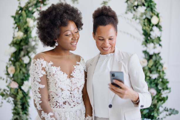 istock Friends on a video call during wedding reception 1320300150