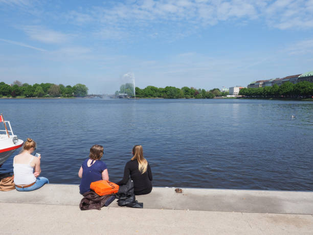 Hamburg, Germany - Circa May 2017: People on Binnenalster (meaning Inner Alster lake) bank