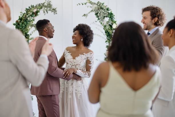 istock Newlyweds dancing their first dance at the wedding reception 1320301091