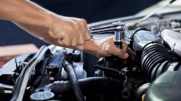 istock Car mechanic working on car engine, car maintenance concept. 1320301147