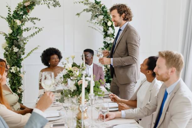 istock Best man giving a toast and speech at a wedding reception 1320301309