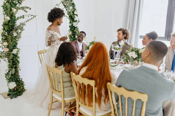 istock Bride giving a toast and speech at a wedding reception 1320301321