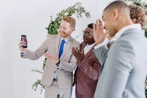 istock Friends on a video call during wedding reception 1320302797