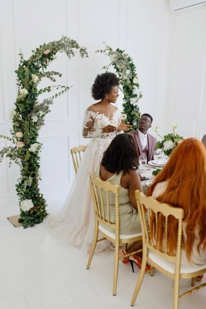 istock Bride giving a toast and speech at a wedding reception 1320302874