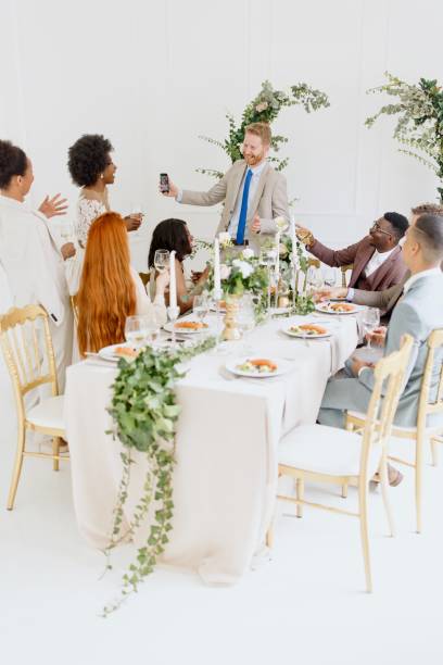 istock Friends on a video call during wedding reception 1320302878