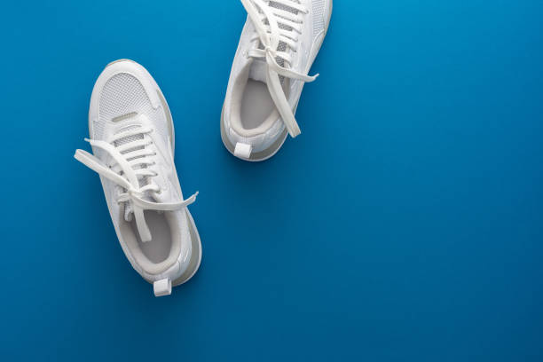istock White sports sneakers isolated 1320302932