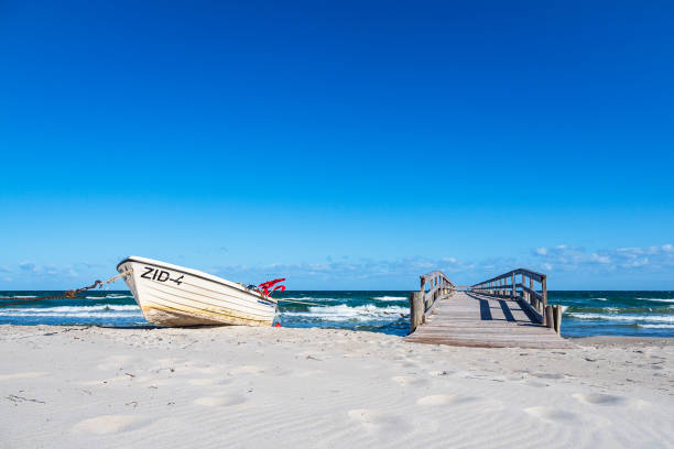 istock Fishing boat on the Baltic Sea coast in Zingst, Germany 1320303615