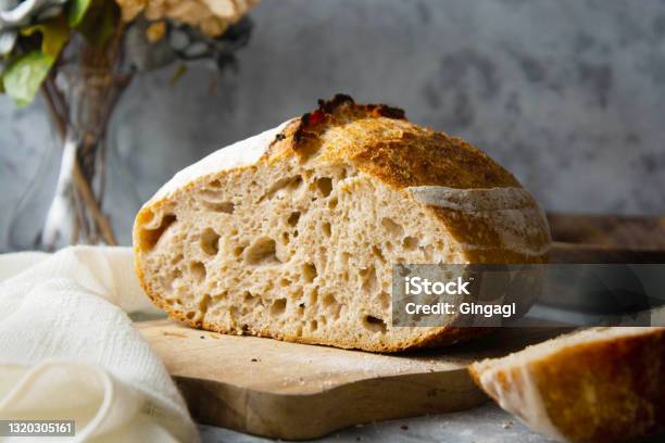 Sourdough Bread Sliced Made From Wild Yeast Cooking Healthy Foods Stock Photo - Download Image Now