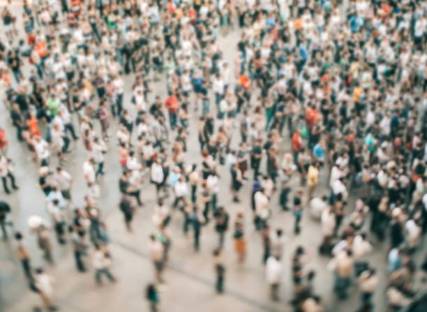 istock Defocused aerial view of a crowd 1320311664