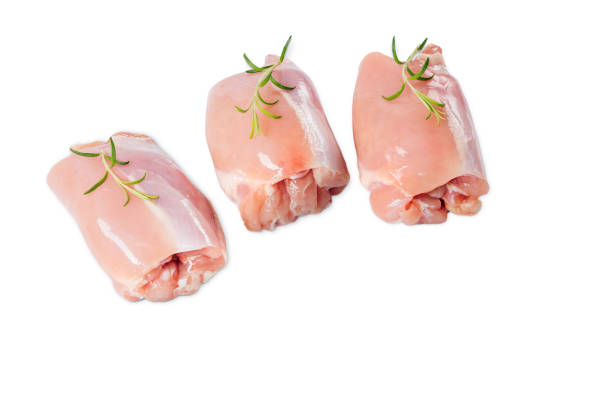 chicken thigh fillet without bone and skinless, isolated .raw chicken thigh without skin on a white background isolade. three pieces of chicken. - thigh imagens e fotografias de stock