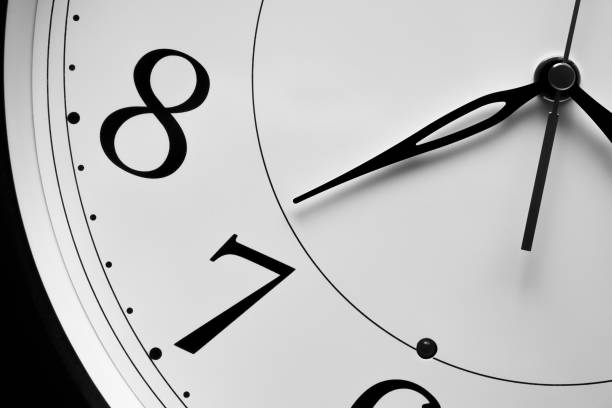 istock Close up of a clock isolated 1320314731