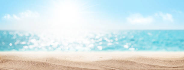 istock Sea beach with hot sand and sunny bokeh 1320317322