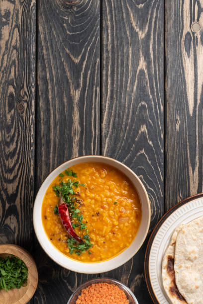 istock Masoor dal. Indian spicy red lentil soup. 1320319608
