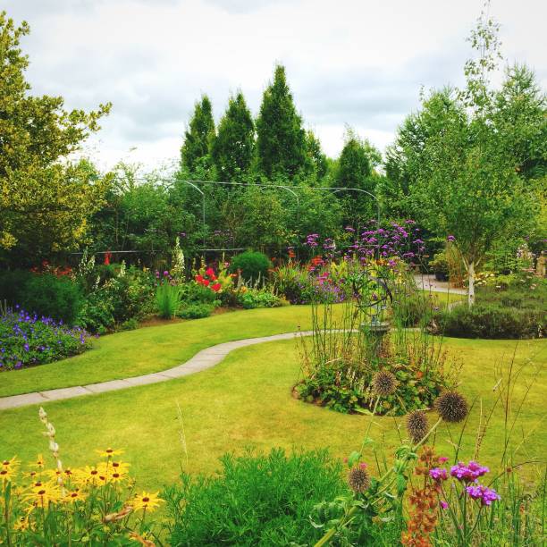 istock Manicured garden in peak summer time condition 1320326194