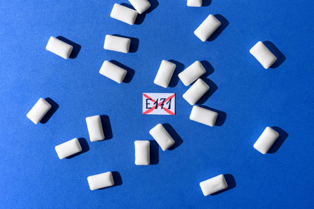 Heap of chewing gum with e171 sign