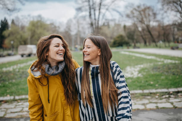istock Friends chat in the park 1320328890