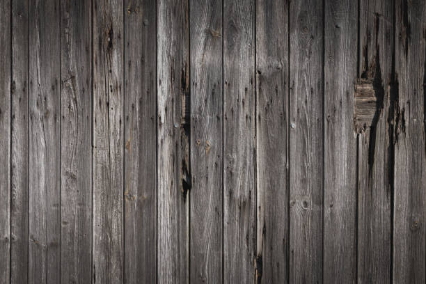 tapumes de madeira velha, textura de fundo desbotada e angustiada - wood cladding - fotografias e filmes do acervo