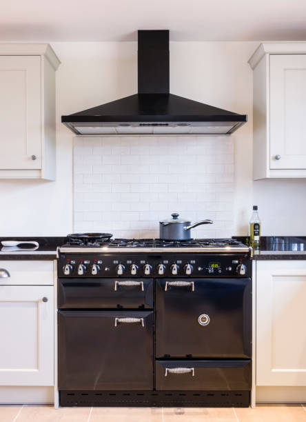 istock Kitchen oven range cooker and hood, UK 1320332150